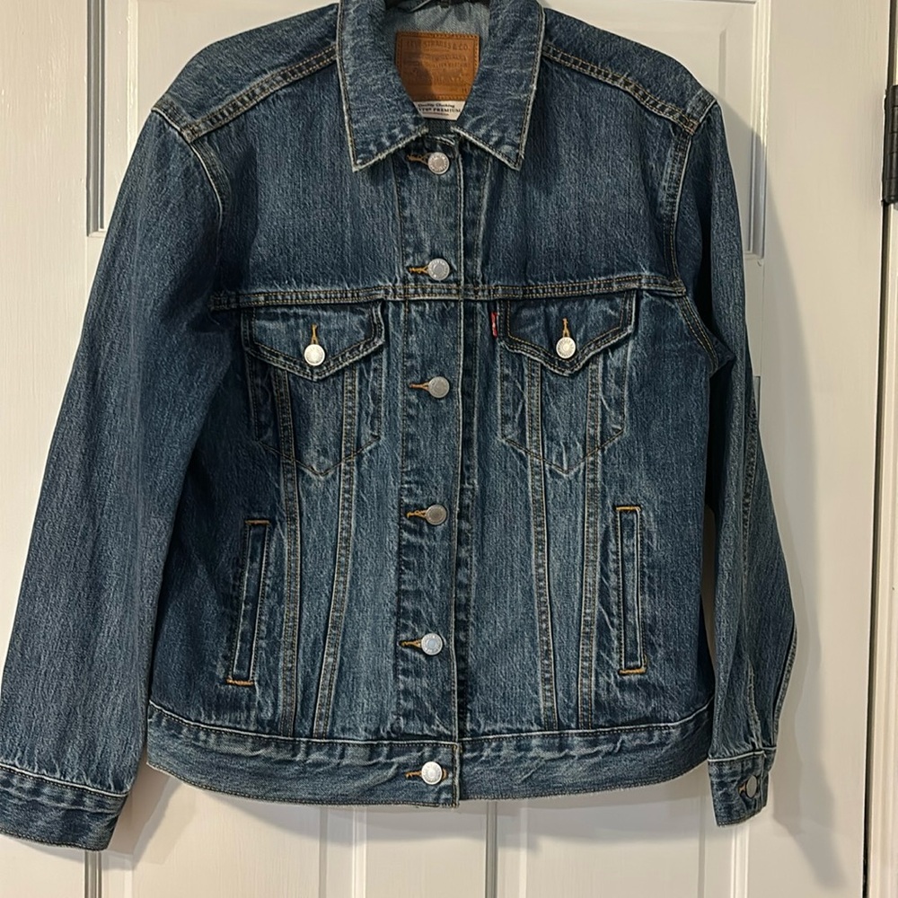 Levi’s woman’s M jean jacket. Perfect condition. Never worn!